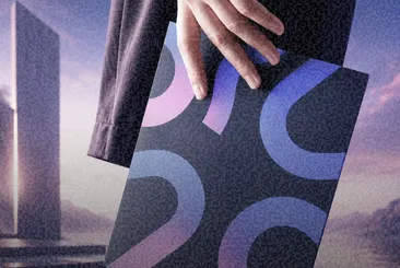 Creative portfolio book against a surreal architectural backdrop